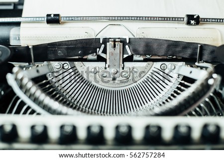 Retro old typewriter with paper sheet