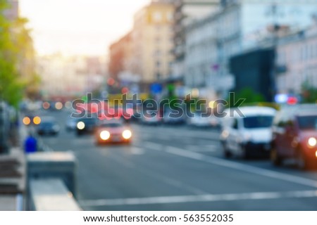cars on the street with lights blurred focus