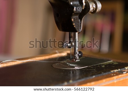 Needle of sewing machine, close up. Tailoring, sew