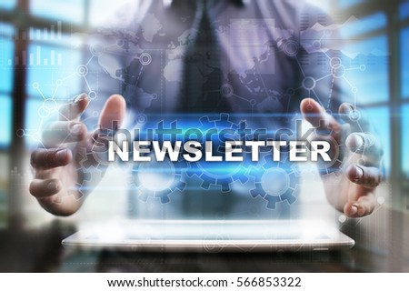 Businessman using tablet pc and selecting newsletter.