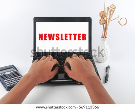 man typing on a laptop on white background with text NEWSLETTER