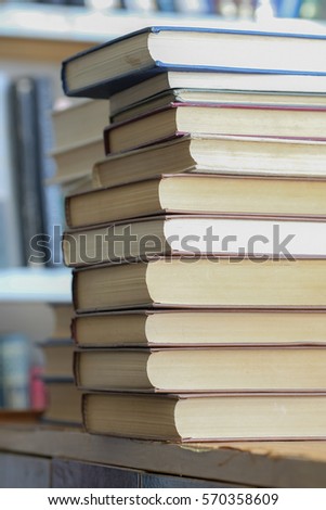 Books on bookshelves in library