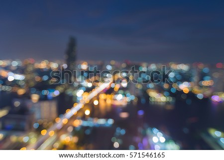 Aerial view city blurred lights night view skyline, abstract background 