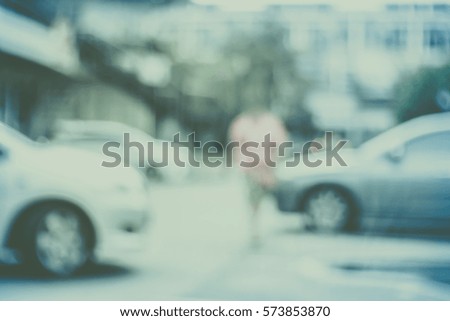 Blurred  background abstract and can be illustration to article of People walk in a parking lot