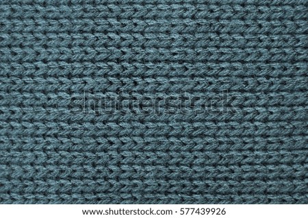 Melange wool knitting. Old knit textile. Cotton wool background for scrapbooking