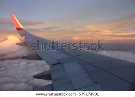 aircraft Wing above the clouds