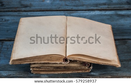 open book blank on old wood background