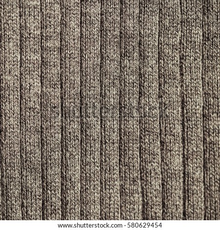 Knitted fabric wool texture close up as a background