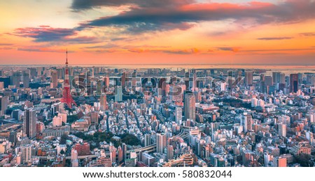 Sunset city view with Tokyo Tower from Roppongi Hills. Attractive sky background.