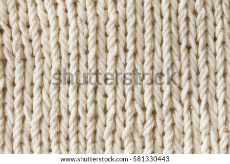 white nitted fabric textured background.nitting pattern