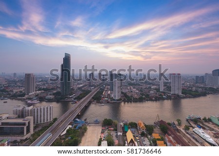 Beautiful of Bangkok aerial view city with Chao Phraya river curve during sunset, Thailand