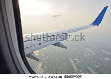 Flap extened, Approach to runway airport with evening sky, flight, Don Muaeng airport, Thailand 
