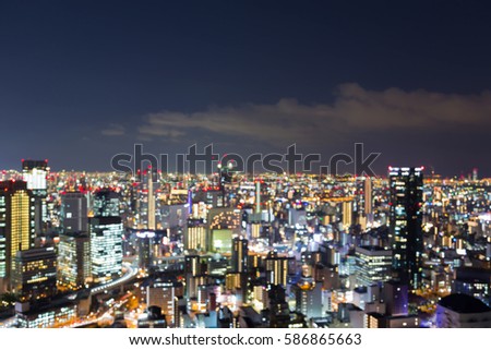 Blurred lights city of Osaka business downtown, night view