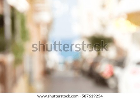BLURRED CITY STREET AT THE SEASIDE