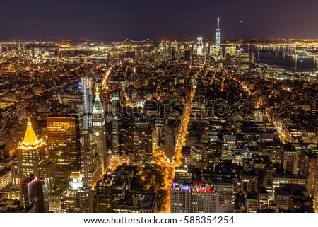 Elevated view of New York City at night.