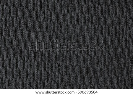 black knitting textile closeup