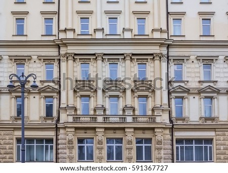 Vintage architecture classical facade building. Front view close up.