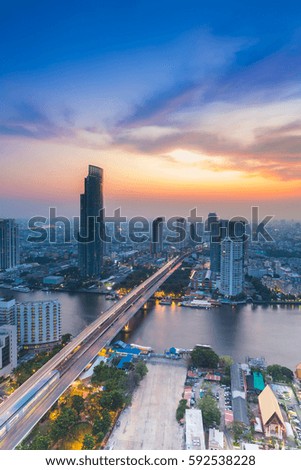 Aerial view, cityscape downtown with beautiful after sunset sky background