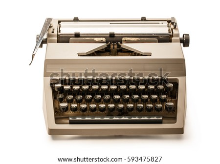 Old-fashioned typewriter with latin alphabet on white
