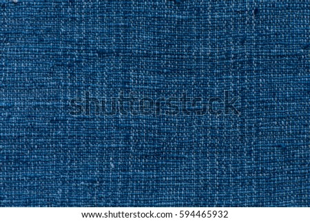 Closeup dark blue yarn textile background and textured, Blue cooton background