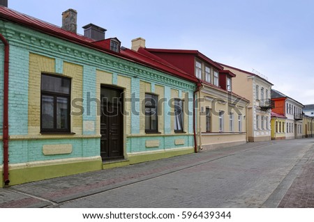 Old street of Grodno with colorful houses in perspective. Belarus.