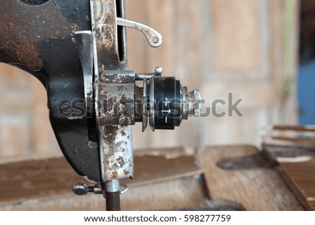 tension regulating thumb nut of old Sewing Machine
