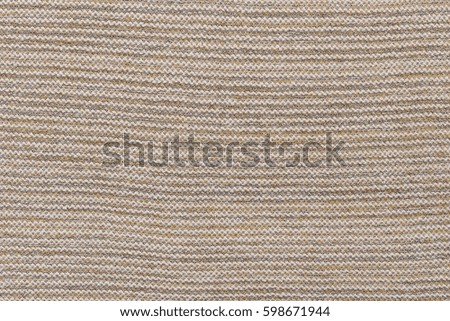 Soft brown fabric background top view. Brown yellow woven texture / wood texture.
