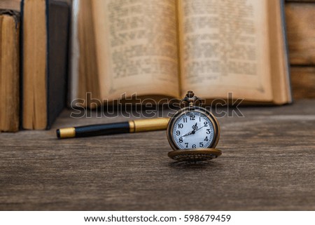 the judge's gavel books on wooden background