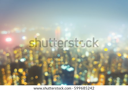 Blurred photo of hong kong city skyline at victoria peak view for background.