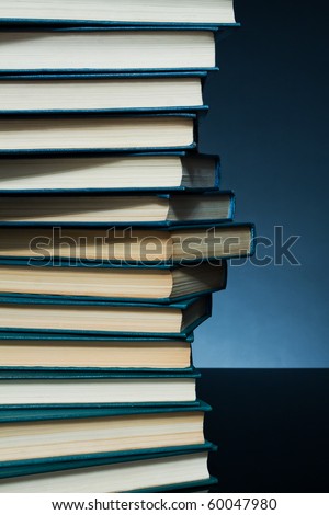 Dark background with books in the form of DNA chain for any design project