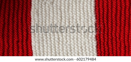 background of Red and White wool of a dress made by hand