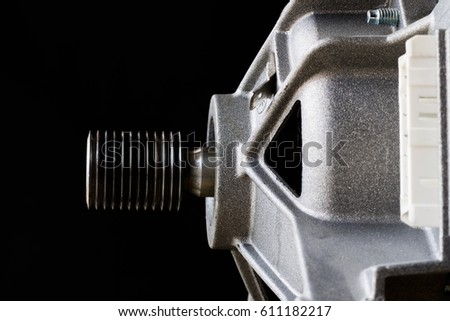 old parts for washing machines on a black background
