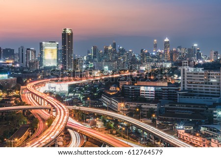 Traffic in Bangkok during rush hour. Bangkok cityscape on the rooftop view. Bangkok business district cityscape. Modern buildings in the big city.