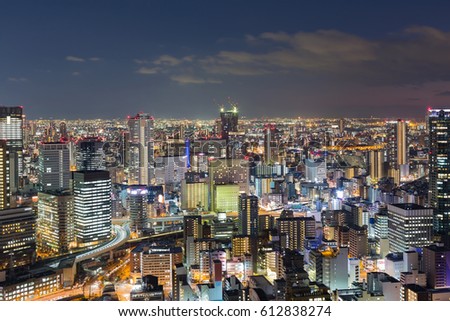 Osaka city downtown aerial view at night from Umeda Sky building