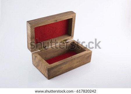 Open wooden box on white background