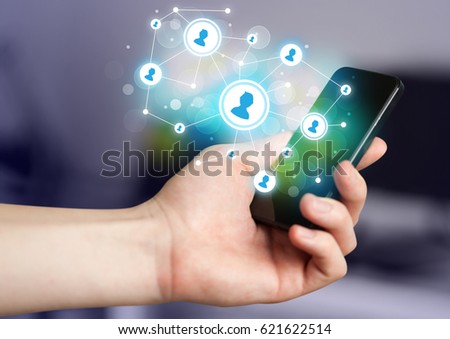 Finger pointing on smartphone with social network illustration