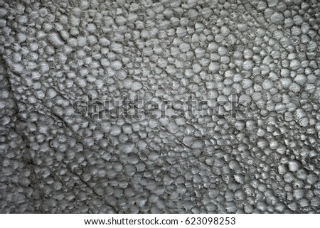 Polystyrene foam close-up. Lots of small and large bubbles styrofoam texture background.
