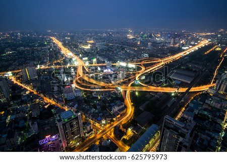 Cityscape of Bangkok city.Bangkok express way and highway on top view in the twilight time.