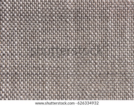 Texture of old textile vintage background with a pattern  color closeup