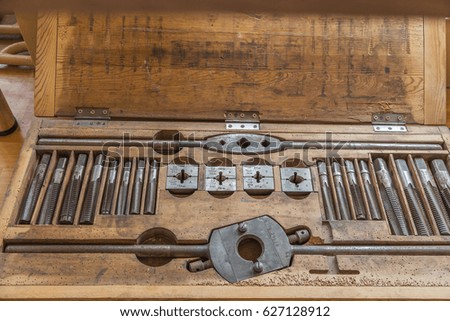 Vintage tool set for cutting resby in a wooden box