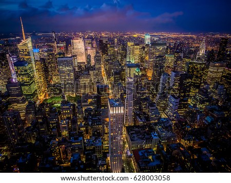 Night shot of Manhattan skyline from the Empire State building