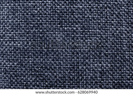 Background of dark blue textile texture. Macro