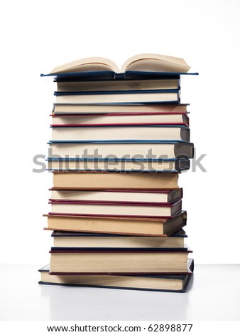 pile of fifteen books on the white background