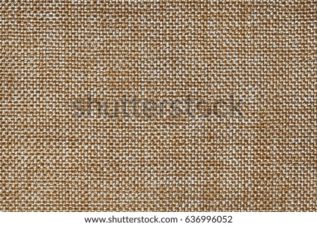 Dark bronze background with wicker pattern, closeup. Structure of the ginger fabric with natural texture. Cloth backdrop.
