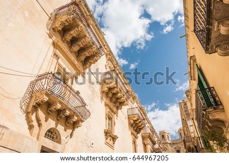 Beautiful baroque balconies of Palazzo Nicolaci Villadorata, Noto, Sicily, Italy.