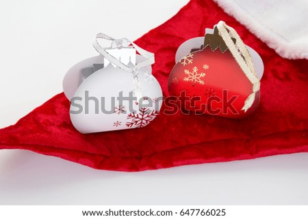 Christmas hat with gift red and white isolated on white