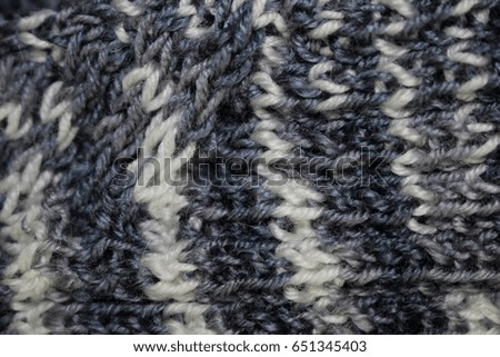 texture black and white knitted fabric with abstract drawings