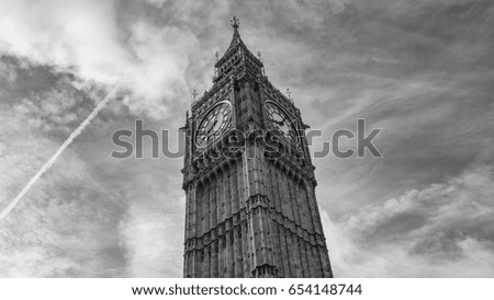 Big Ben against cloudy sky in black and white colors, london, uk