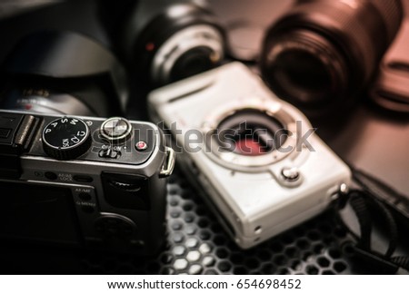 Mirrorless camera, Digital camera, lens, photographer concept