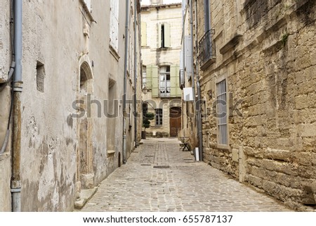 Picturesque alleyway in the small town of Uzes, South France